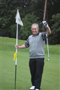 Dickson celebrates with an air punch, after six matches and three play-offs, he really is a worthy Champion!