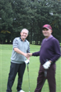 A magnanimous Clayton shakes hands with our TSG MatchPlay Champion!