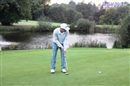 ...while Taylor Putts out...