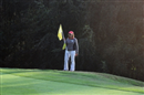 Ms.Lockwood watches on as Taylor tries to keep the game alive at 16th green...