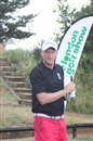 Mr.Ramsay looks very suspicious as he tells his playing partners his club selection ...