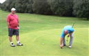 Mr.Benstead demonstrating that TSGers can show the greenkeepers a thing or two about course maintenance ...