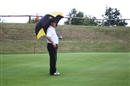 Mr.Joy ... choosing to take cover with a parasol (What rain?!).