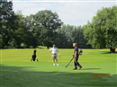 Cottesmore - Phoenix Course - Greenkeeper Team clearing the green ( 13th?/14th?). John Wyatt looking on.
