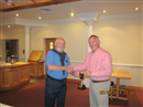 Ken receiving the Birdie league winners award